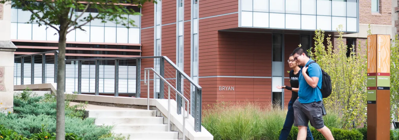 Bryan Hall facade with two students walking